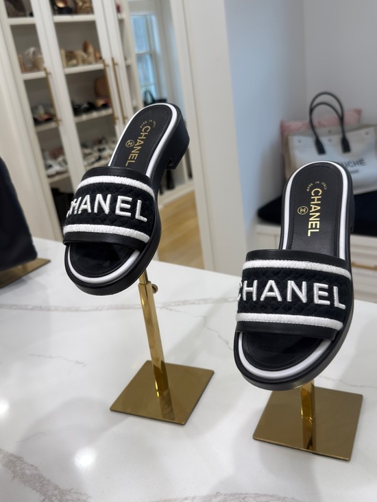 CHANEL Shoes - CHANEL Black and White Logo Slide Mules